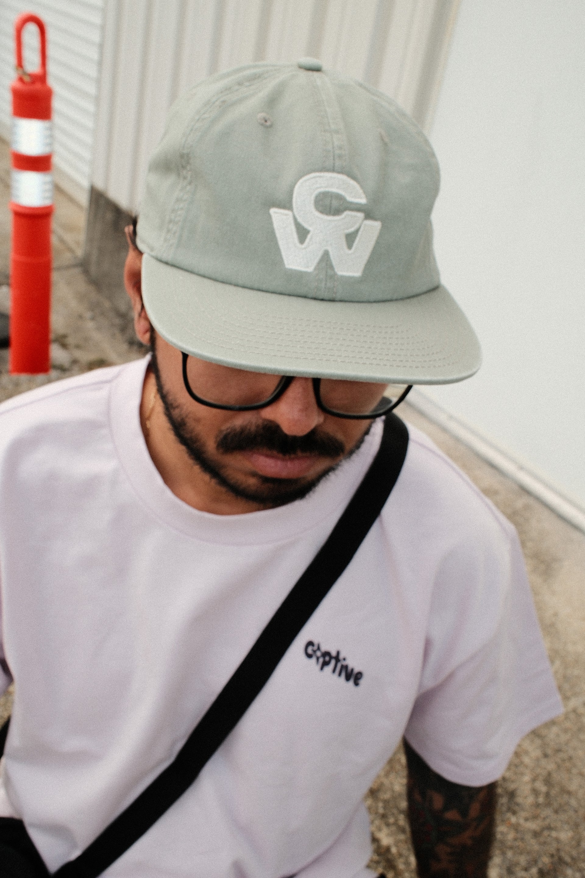 FADED CW LOGO CAP MOSS